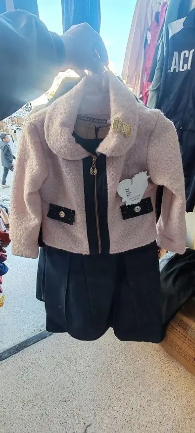 ملابس اولاد عيد image